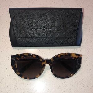 Never been worn Salvatore Ferragamo sunglasses .